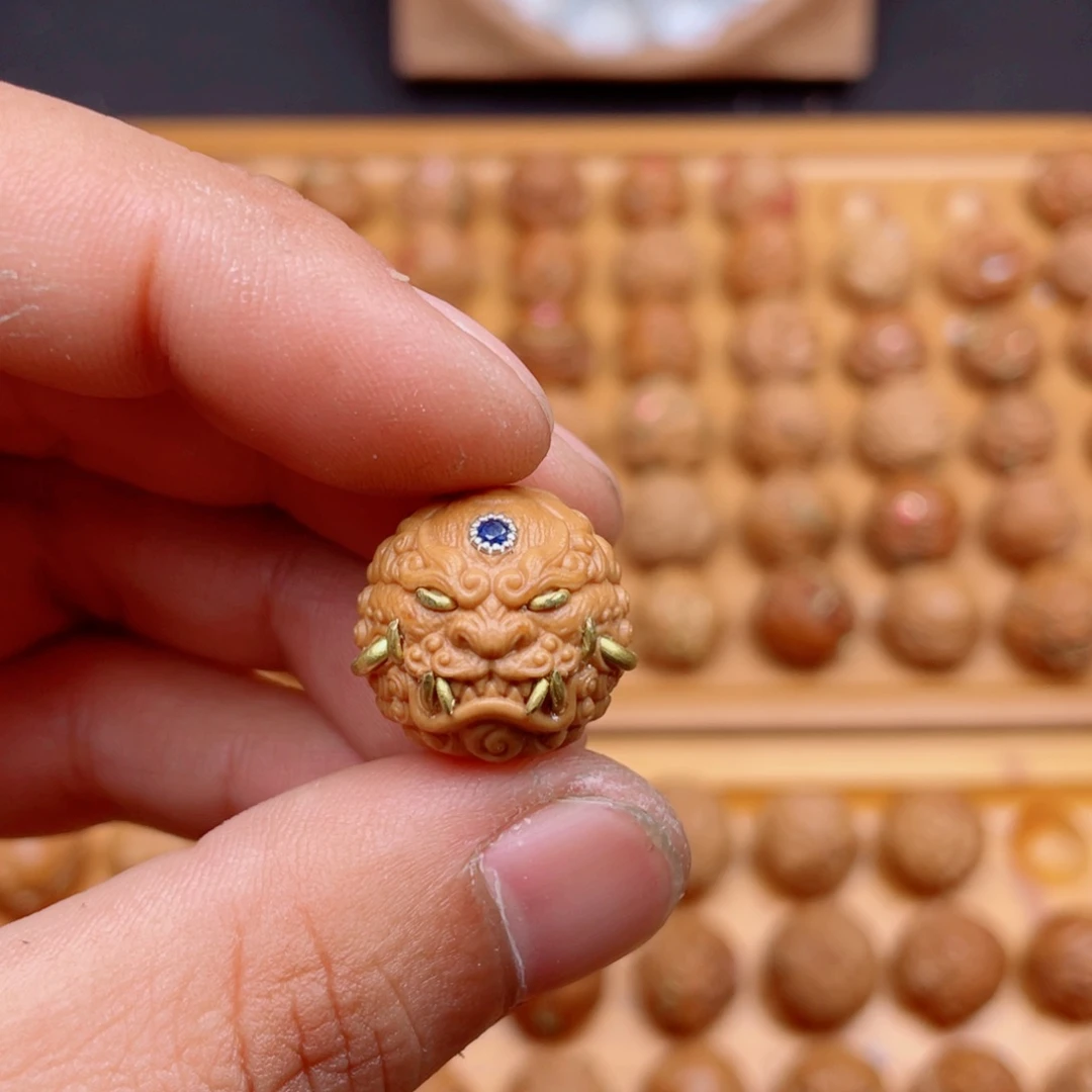 海***.猴头核桃吊坠猴头核桃唐狮满镶