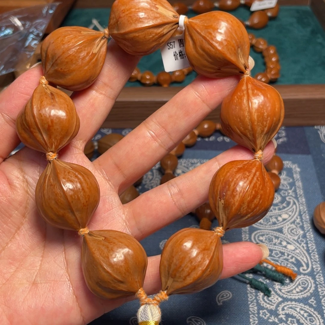 吊坠橄榄核四花素串