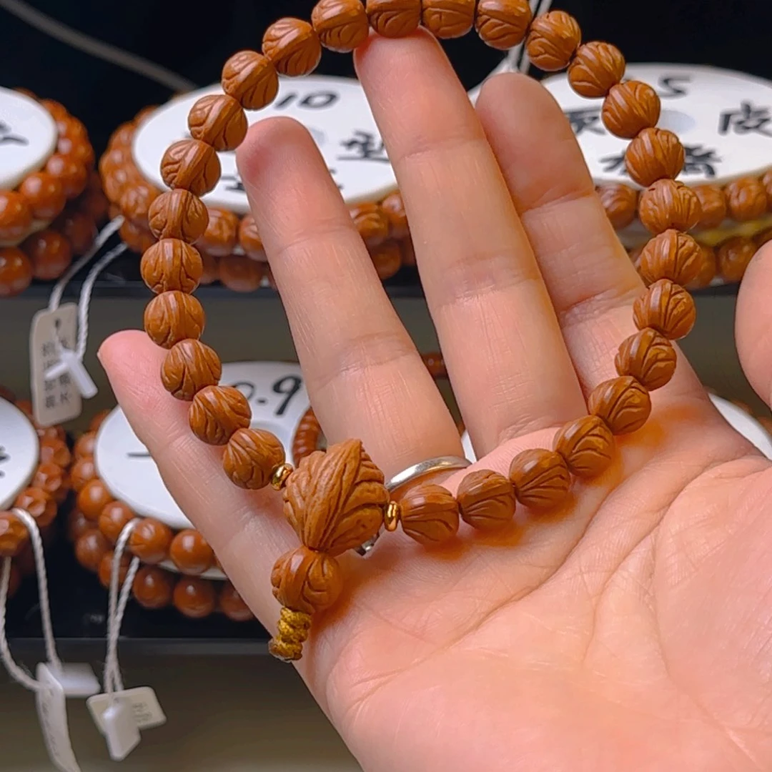 桃核手串贺*龙纹桃核原皮元宝手持