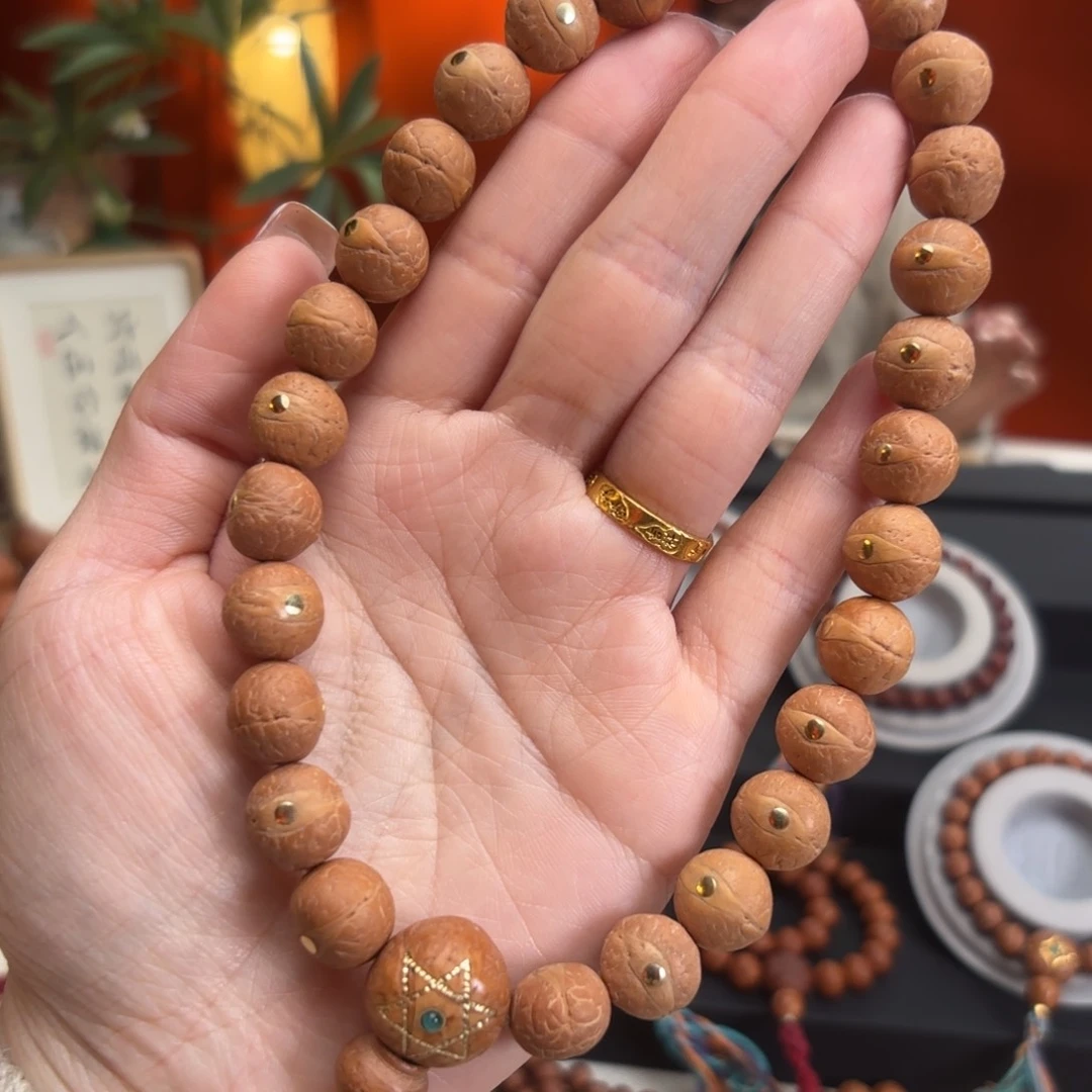凤眼菩提手串油*?12毫米手持铜钉