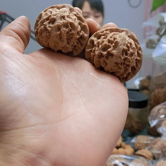 【闪购商品】把件文玩核桃43.红皮桃心宫灯