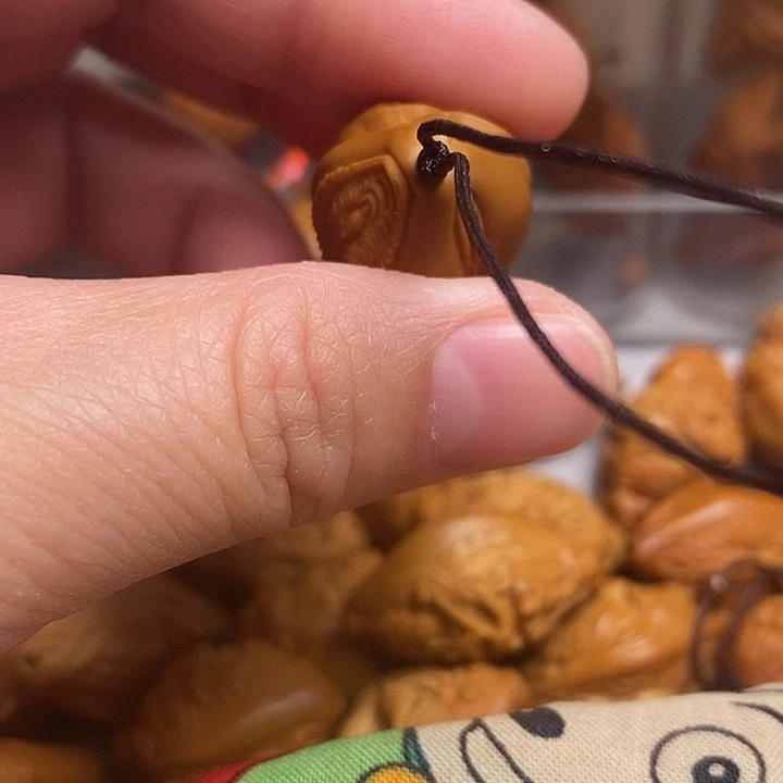 橄榄核吊坠生命的，三面