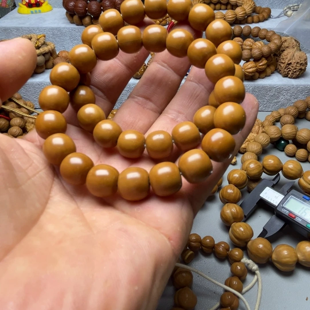 桃核手串猴头雕刻老型8