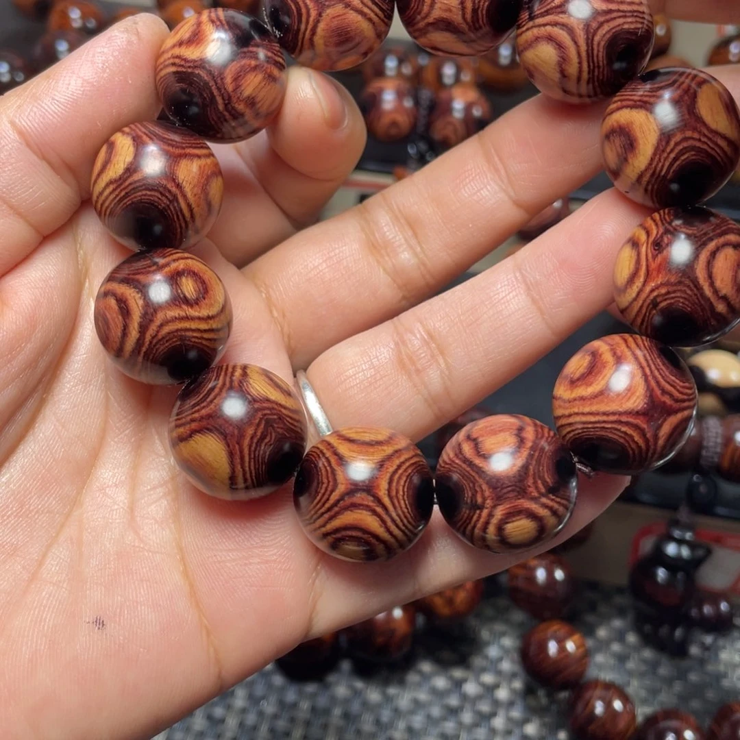 8***8花梨木类2.0鬼脸对眼