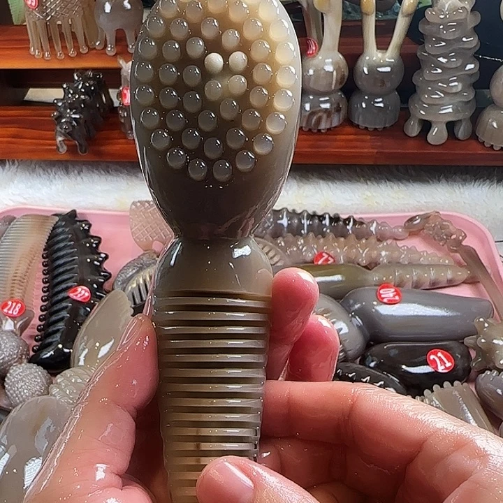 港牛牛角头疗梳脸部按摩莲蓬