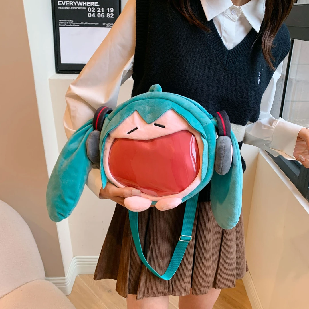 可爱卡通初音系列体系未来痛包软乎乎可爱毛绒笑容收纳包包A652