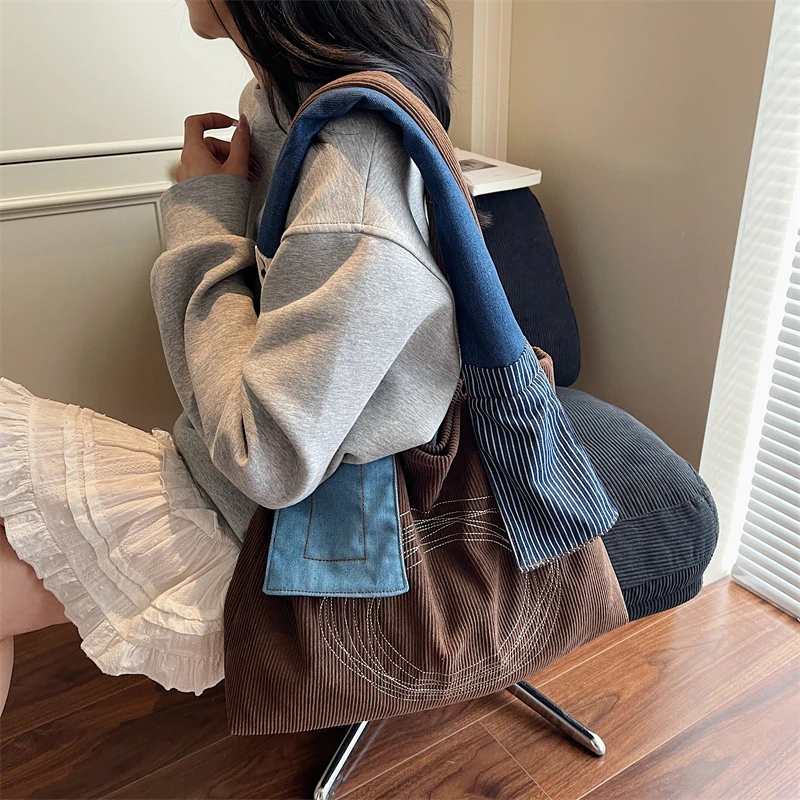 日系帆布购物袋腋下包包女2025新款大容量学生复古拼接单肩托特包