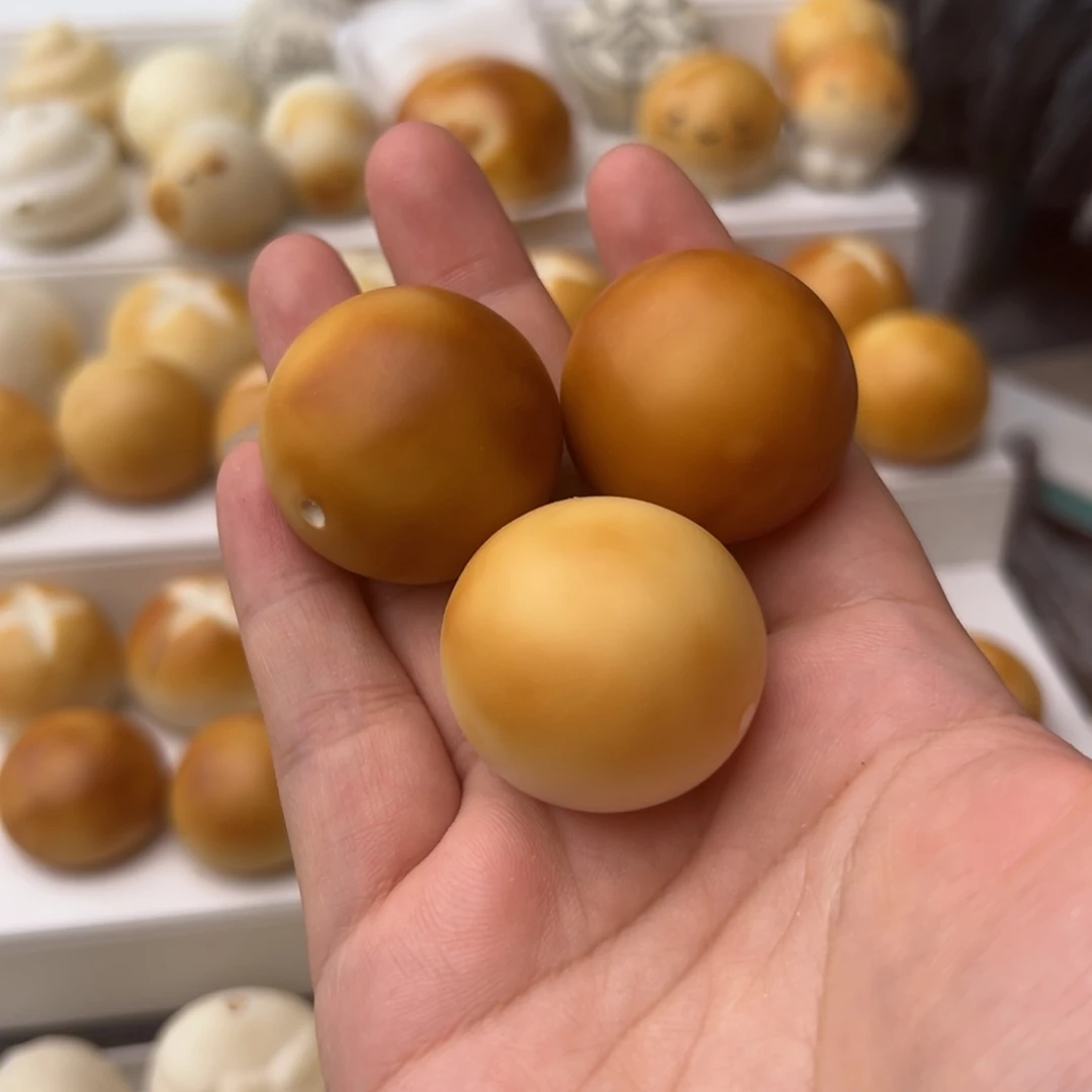 玉***帝菩提根/象牙果把件烤馒头3个画棕色猫爪