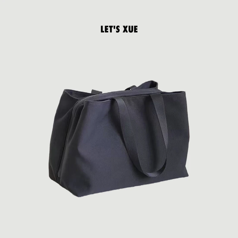 XUE【黑尾痣】2025早春新款 极简风大容量女包