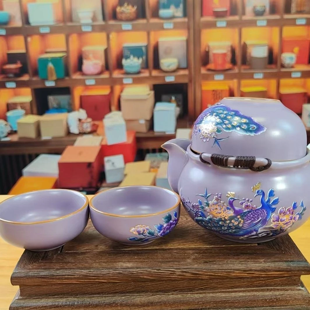 紫色变色孔雀手抓壶一壶三杯A5928