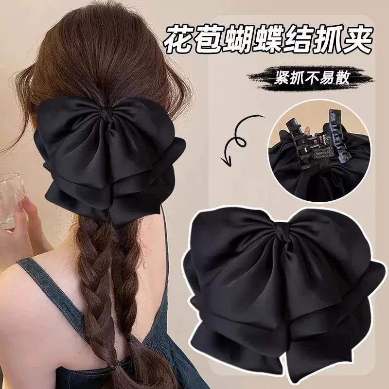E新款百搭法式高级感后脑勺盘发丸子彩色缎面蝴蝶结花苞抓夹头饰