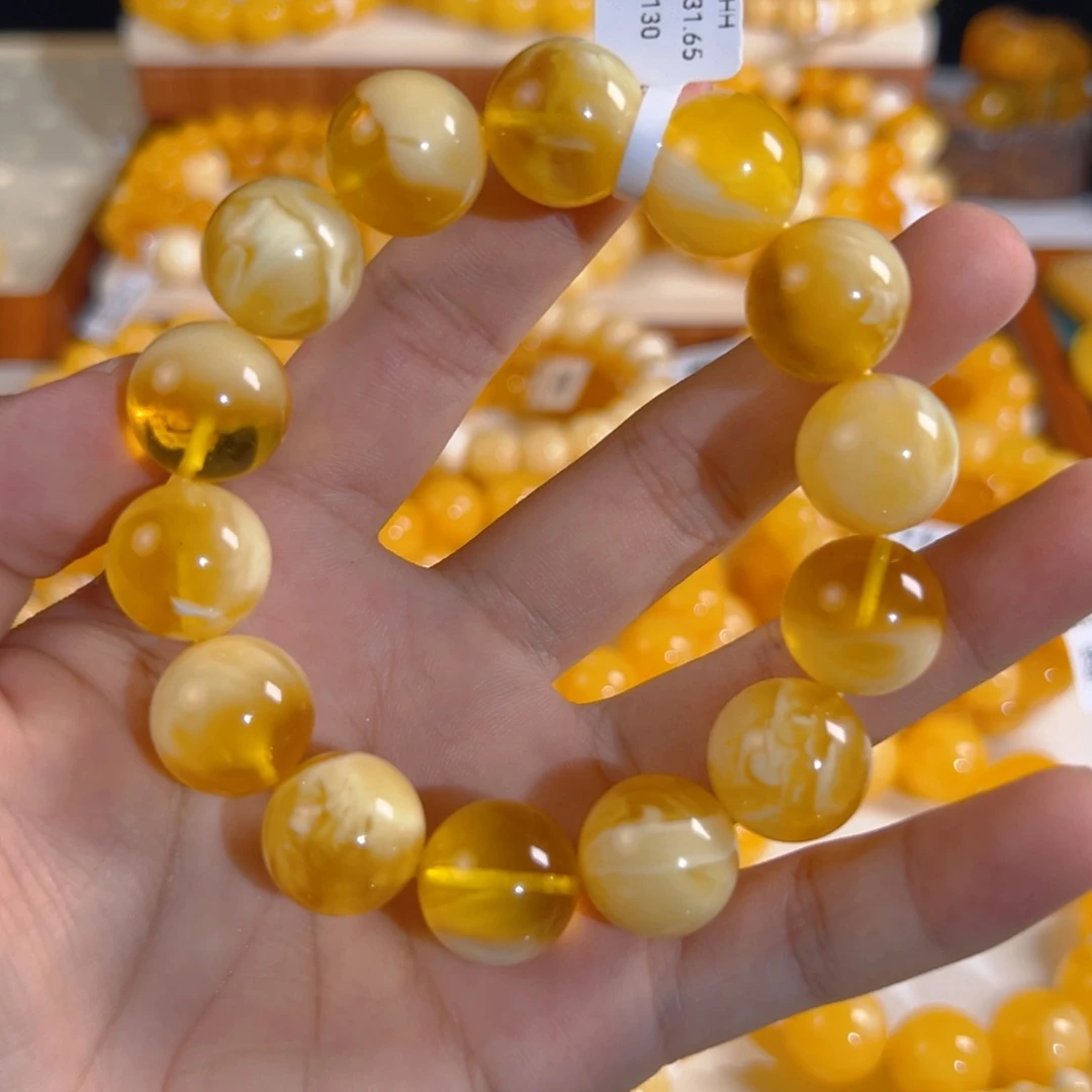 未镶嵌琥珀裸石31.65g金瓷白妖花15mm