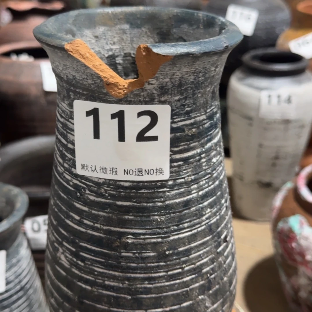 瑕疵112带孔瓶口瑕疵