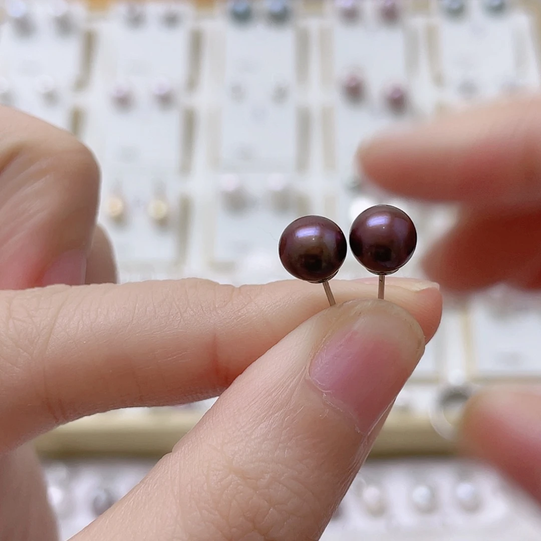 潇***潇淡水珍珠银S925镶嵌耳饰