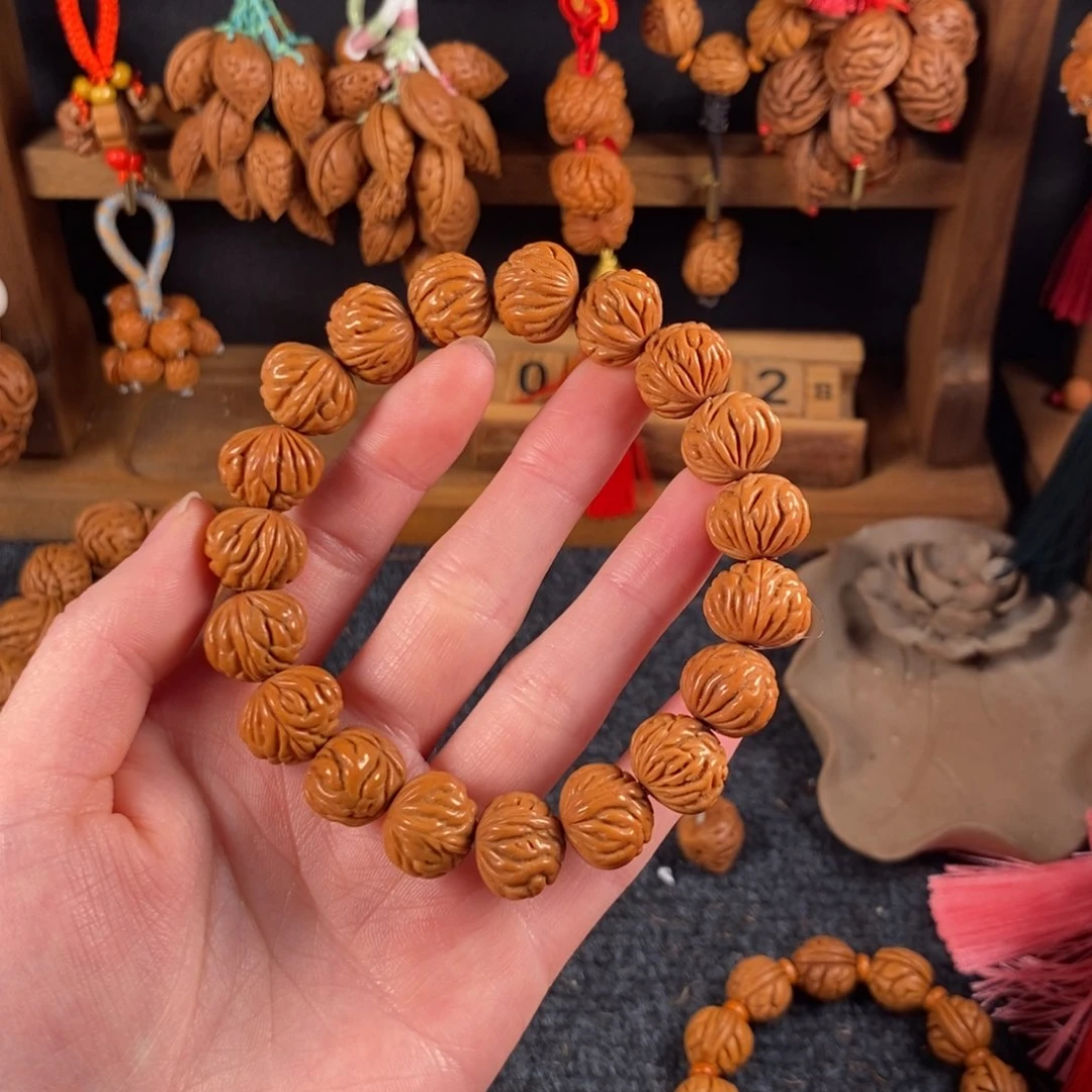 吊坠桃核桃枭手串