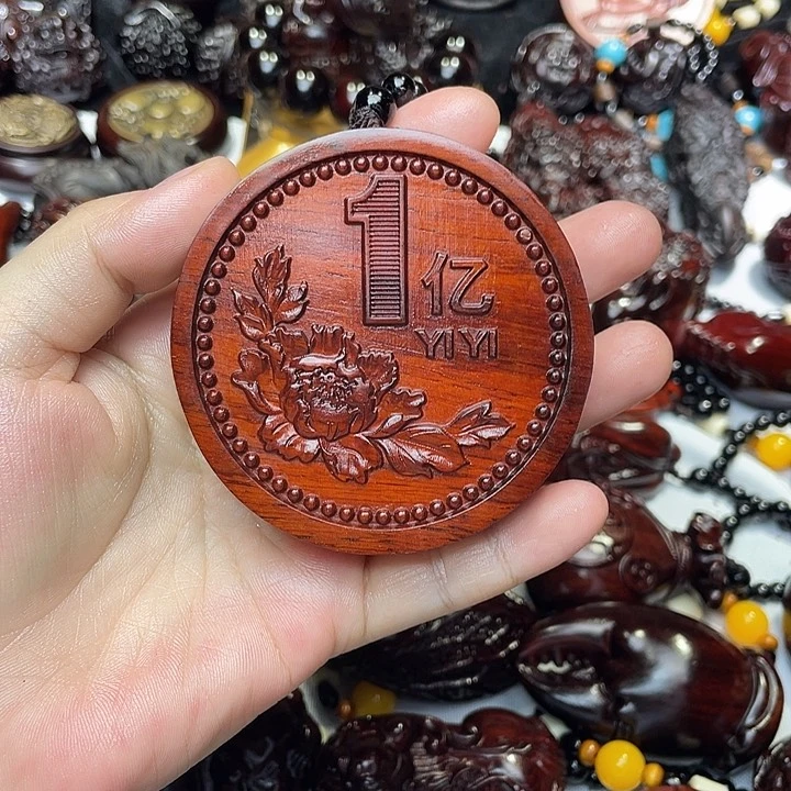 木紫檀木1亿手把件