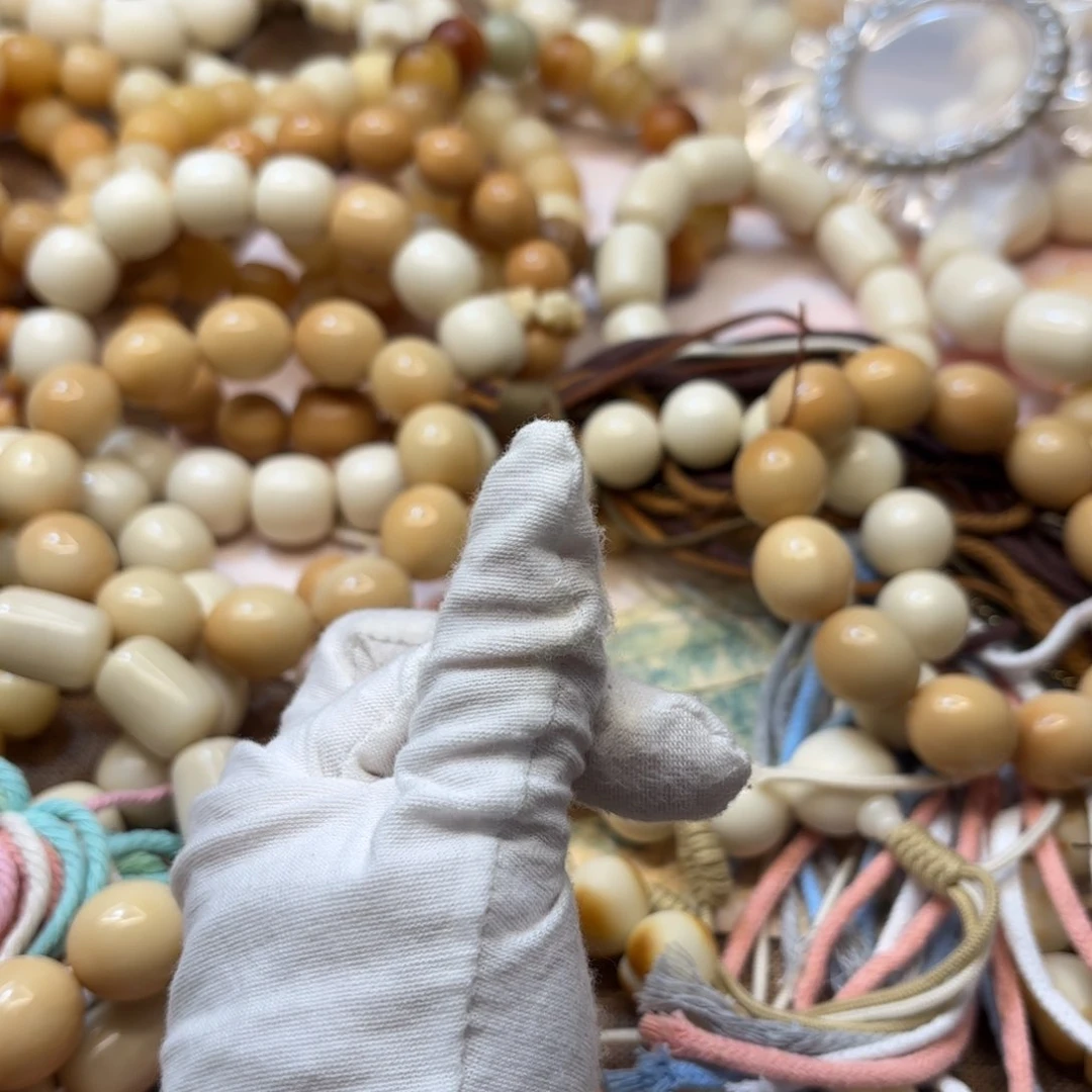 凌***.菩提根/象牙果吊坠27干磨牙果年糕白色单颗发两颗