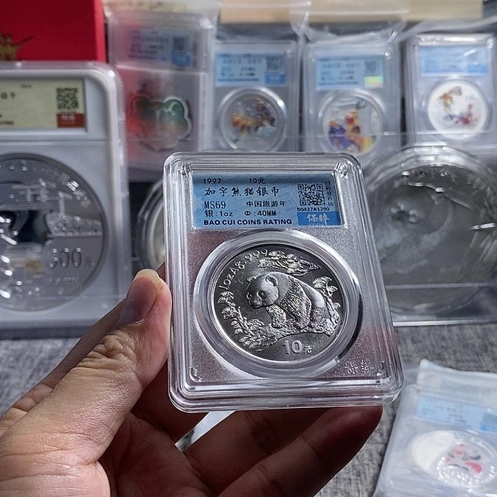 纯银评级69分1997年中国旅游年加字猫无盒证