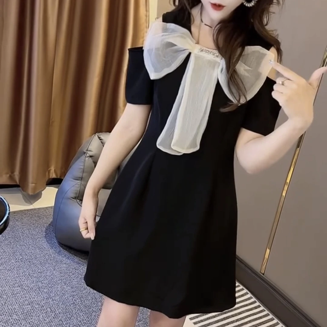 夏季新款法式赫本风蝴蝶结露肩收腰气质显瘦A字连衣裙