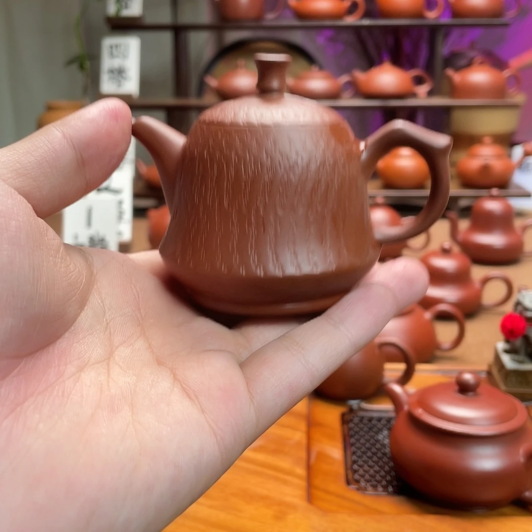紫砂茶壶飞***托潮州手拉