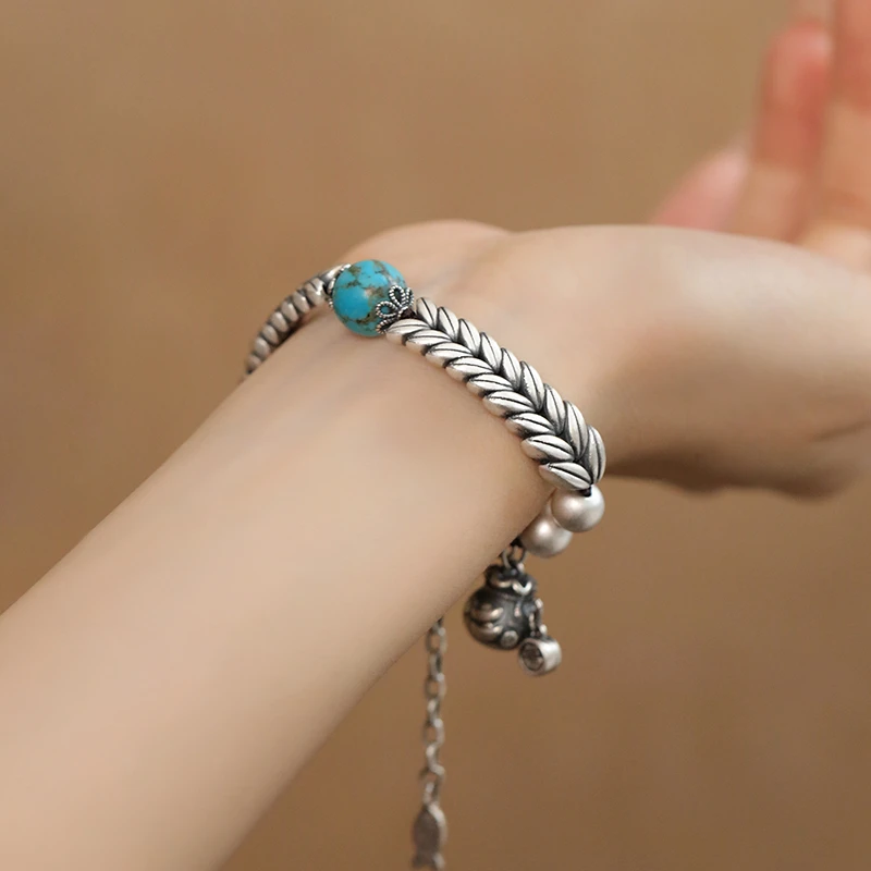 <晶贵坊>足银麦穗福袋绿松石手牌招财纳福s925银鱼尾坠手链