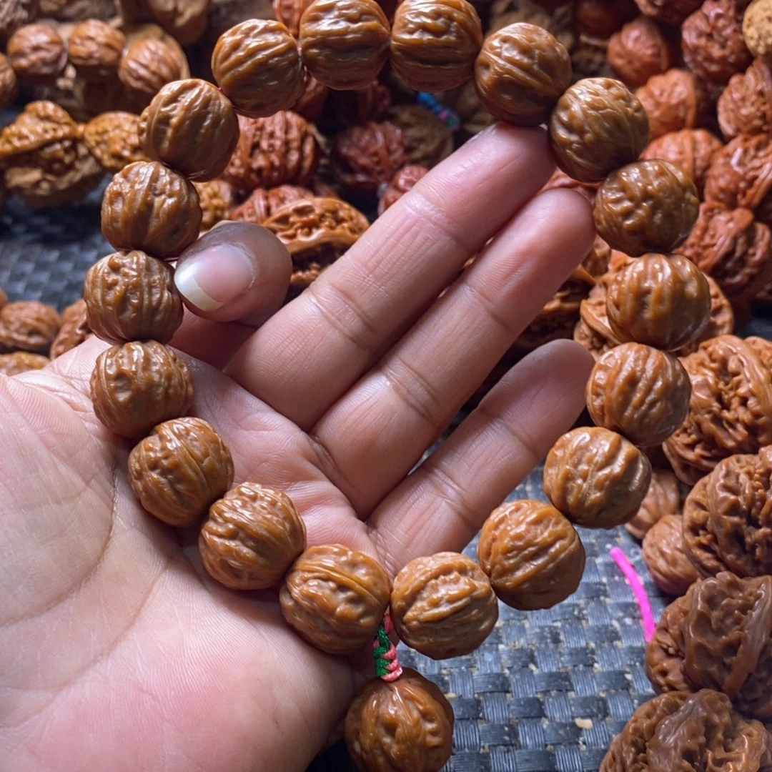 宵***羽吊坠文玩核桃树王