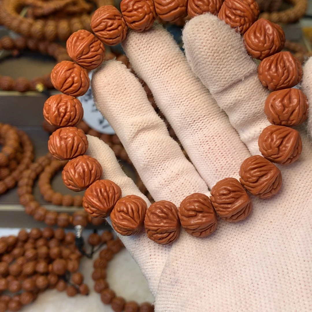 用***2桃核手串秦岭龙纹