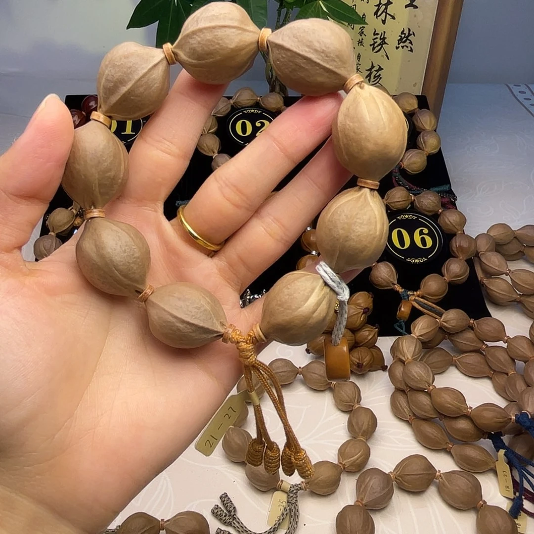 山***茶手串橄榄核梅林铁核21*27