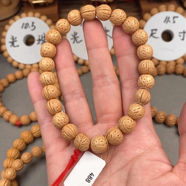 桃核手串水****浪月兔10.5抛光尺寸误差0.5之间