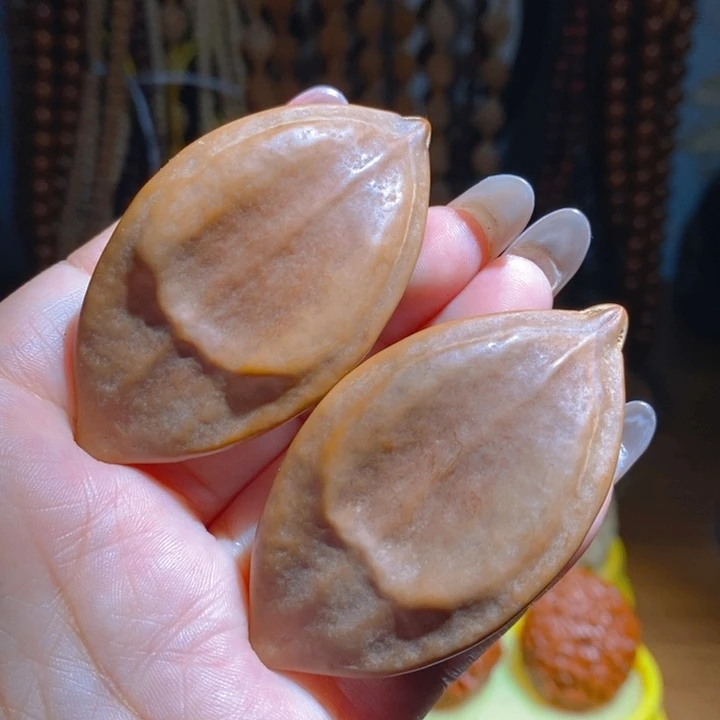 野生柳叶橄榄核手把件