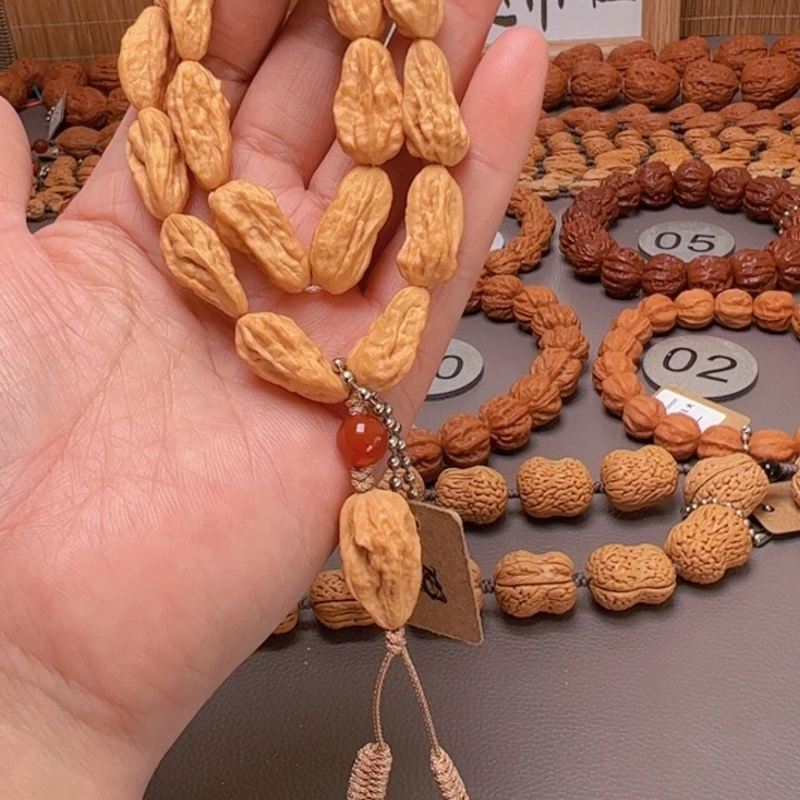 吊坠文玩核桃金*浪核桃手持