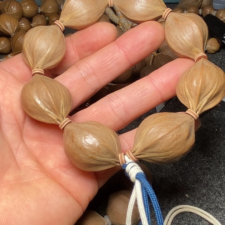 橄榄核手串2.4四花21号