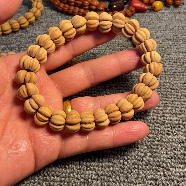 天***勤吊坠文玩核桃手串