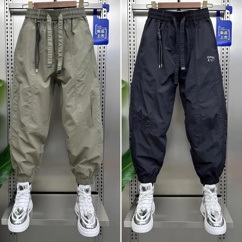 2025夏季男裤薄款速干休闲裤潮牌时尚拼接显瘦网红束脚哈伦九分裤