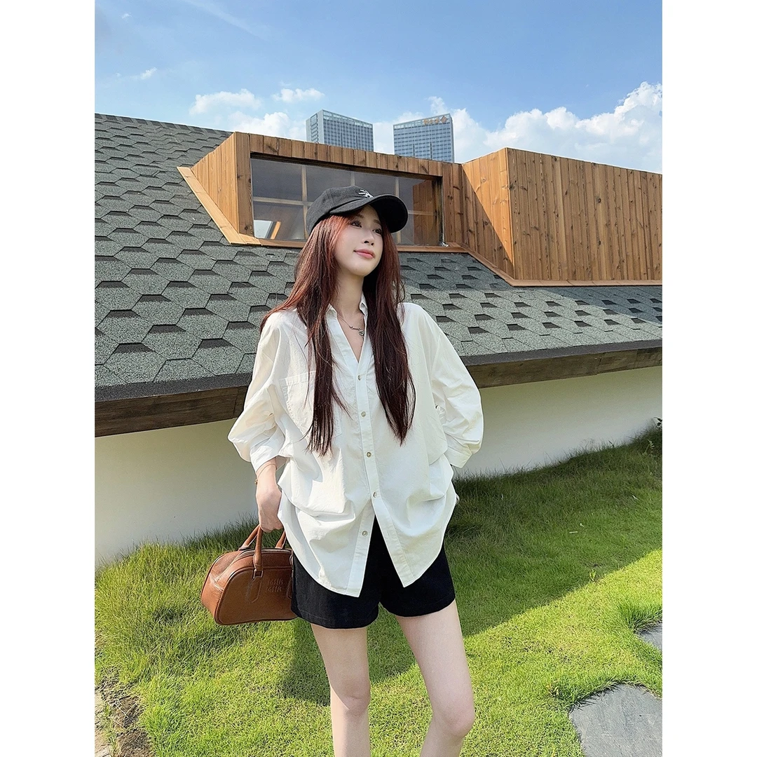 韩系慵懒风宽松百搭显瘦设计感V领衬衫女春秋新款灯笼袖口袋上衣