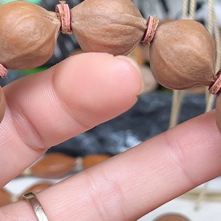 ️***者橄榄核吊坠1720素四花