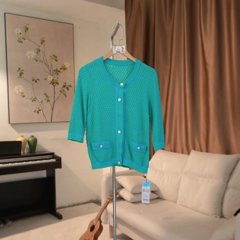 G495 弹力修身钩花镂空九分袖针织开衫女 636C31