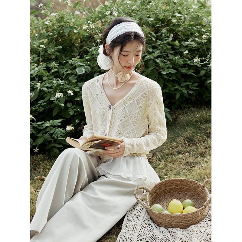 【年中大促】谜秀新品空气感菱格针织衫女2025春撞色海星扣通勤慵懒