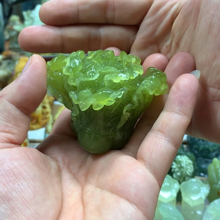 普***加未镶嵌蛇纹石玉手把件