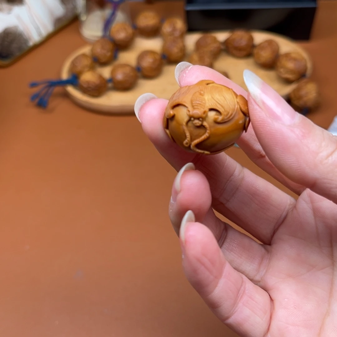 出***车橄榄核手串/手链福在眼钱单子