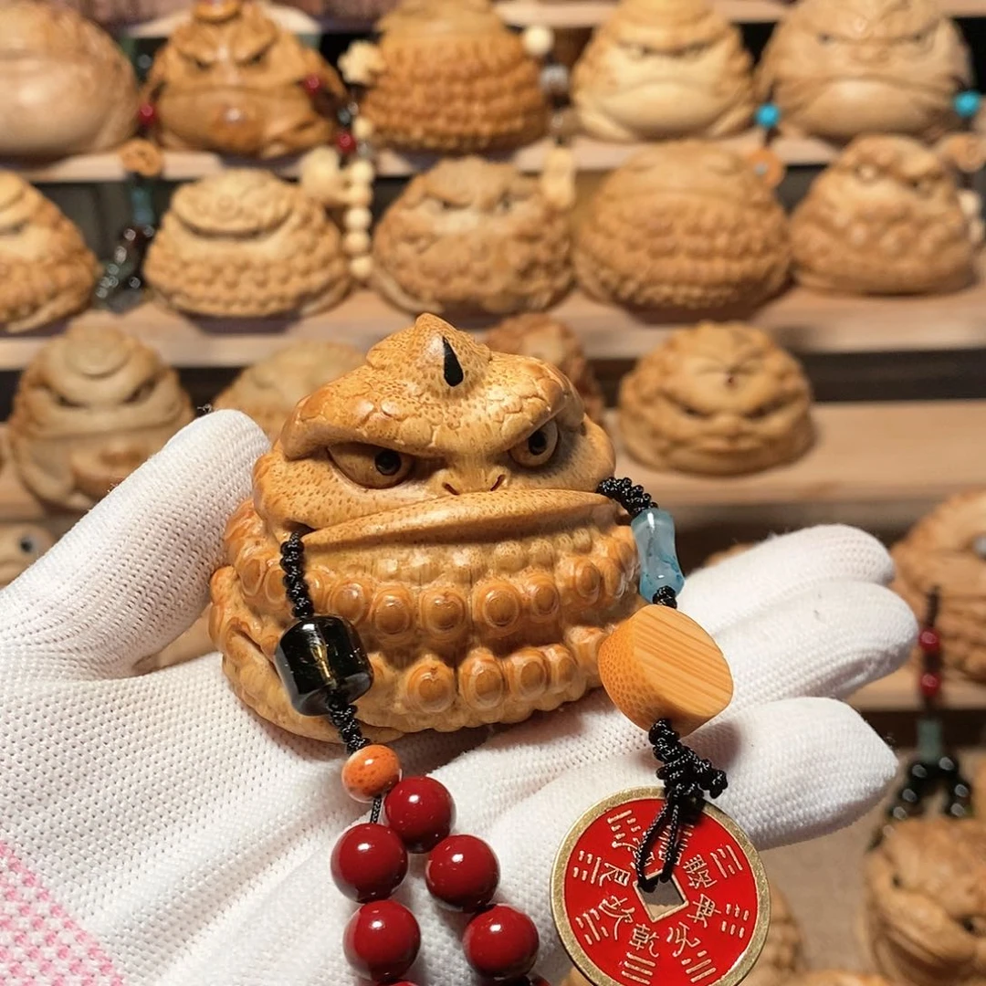 竹北***哥竹根雕金蟾手把件