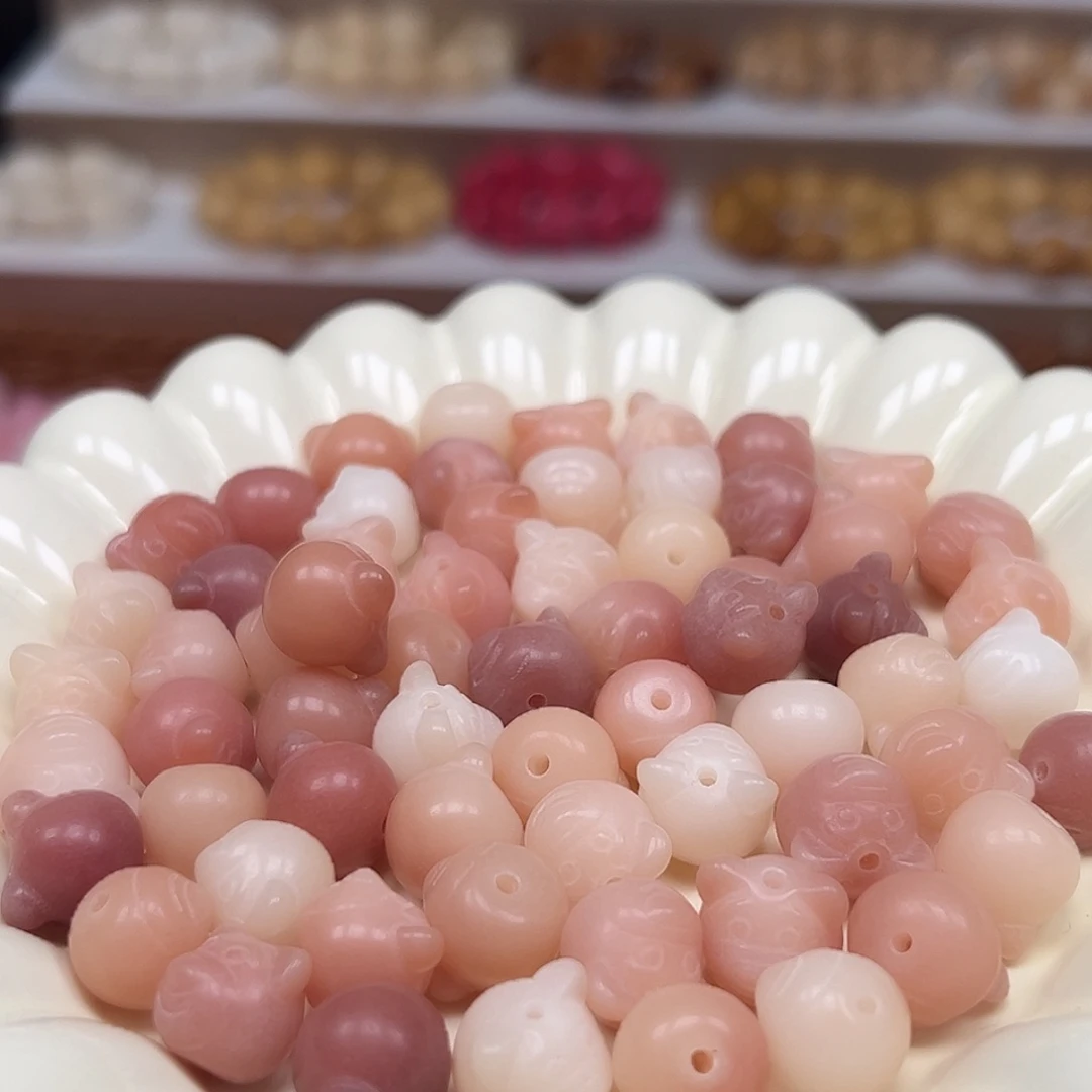 菩提根/象牙果手串粉草莓熊23颗
