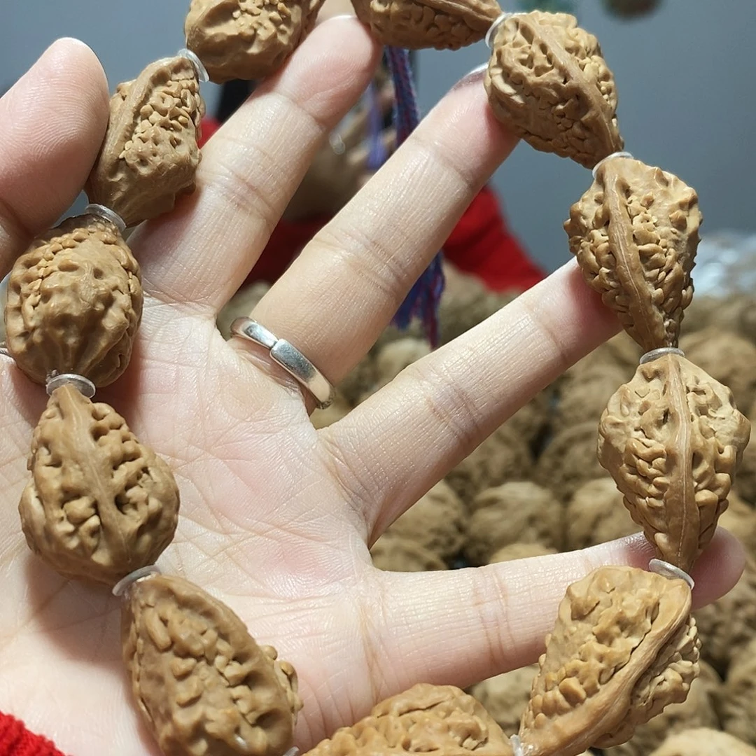 文玩核桃吊坠麒麟角