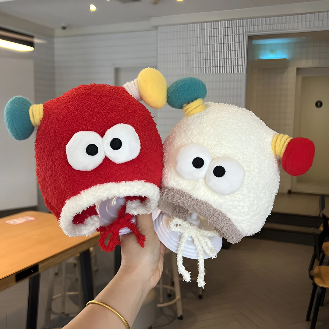 婴儿帽子秋冬新款可爱搞怪大眼睛毛绒保暖帽小月龄宝宝针织护耳帽