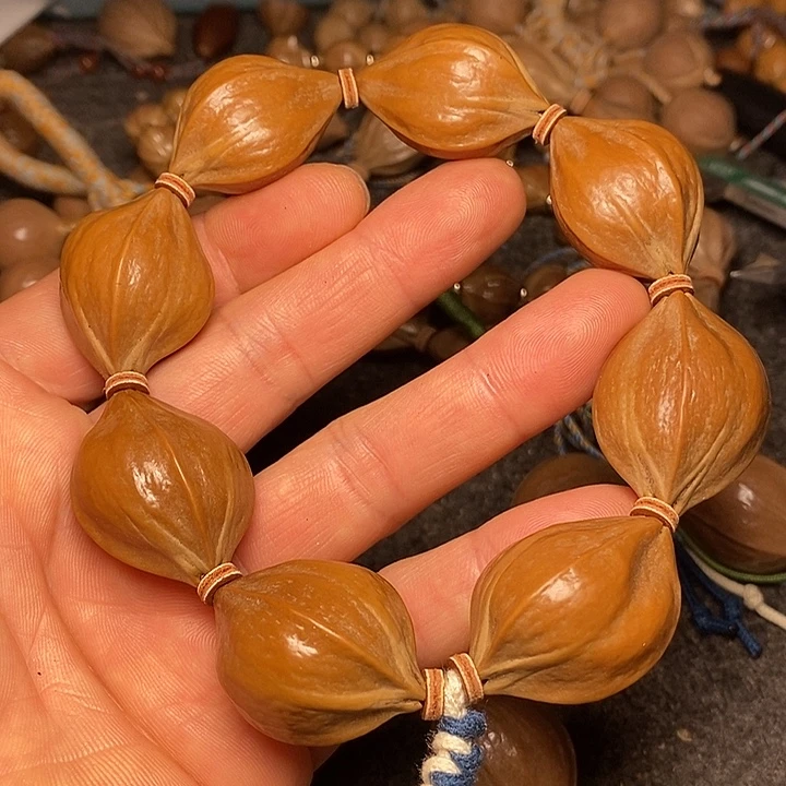 橄榄核手串2.4四花4号