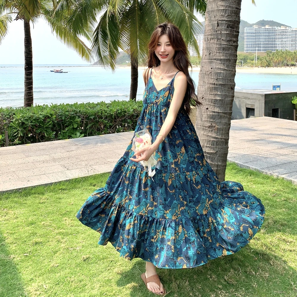 设计感蓝色多巴胺印花连衣裙女2025夏款韩系显瘦垂坠感减龄吊点裙