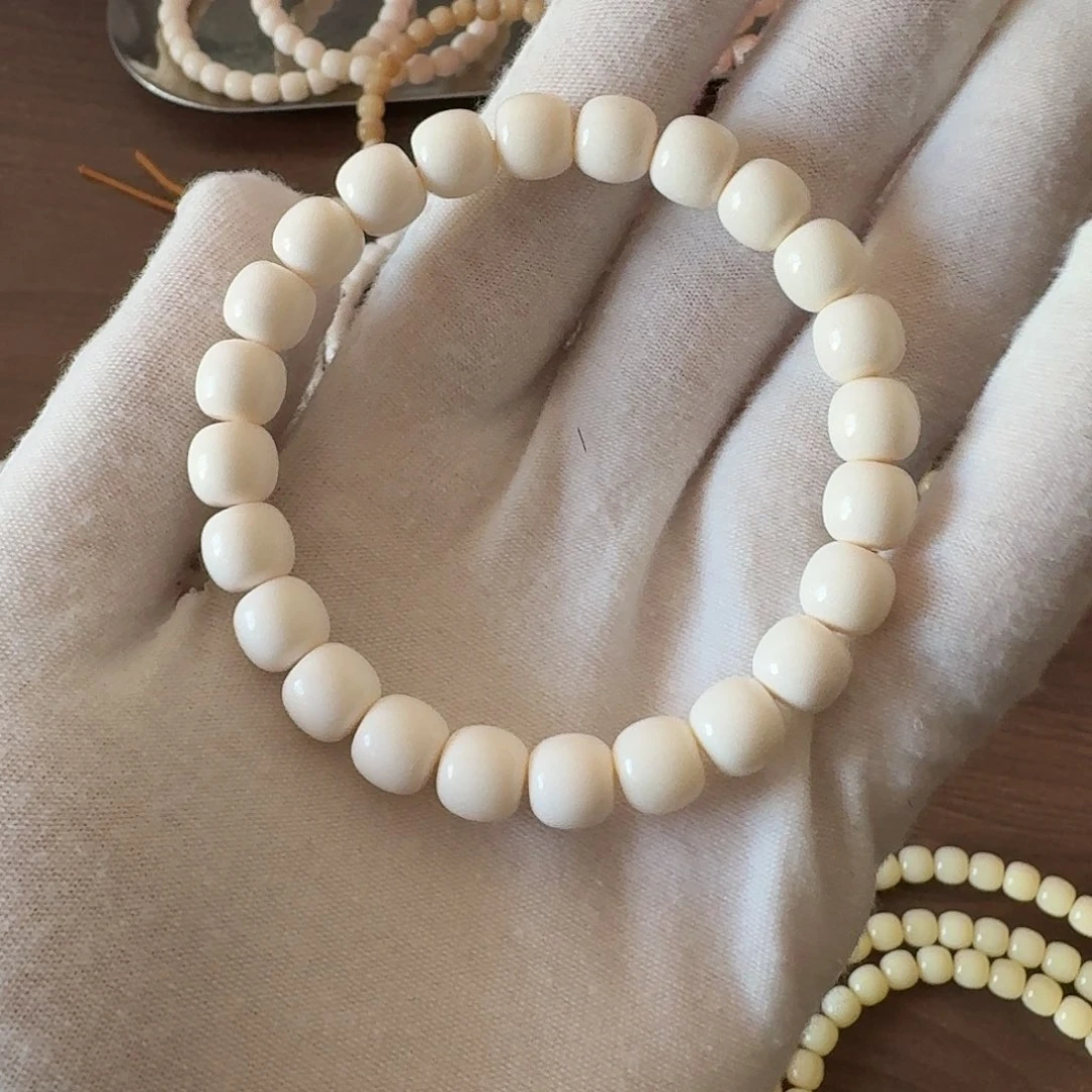 手串/手链驼骨9mm极少棕 特价 孔道微瑕