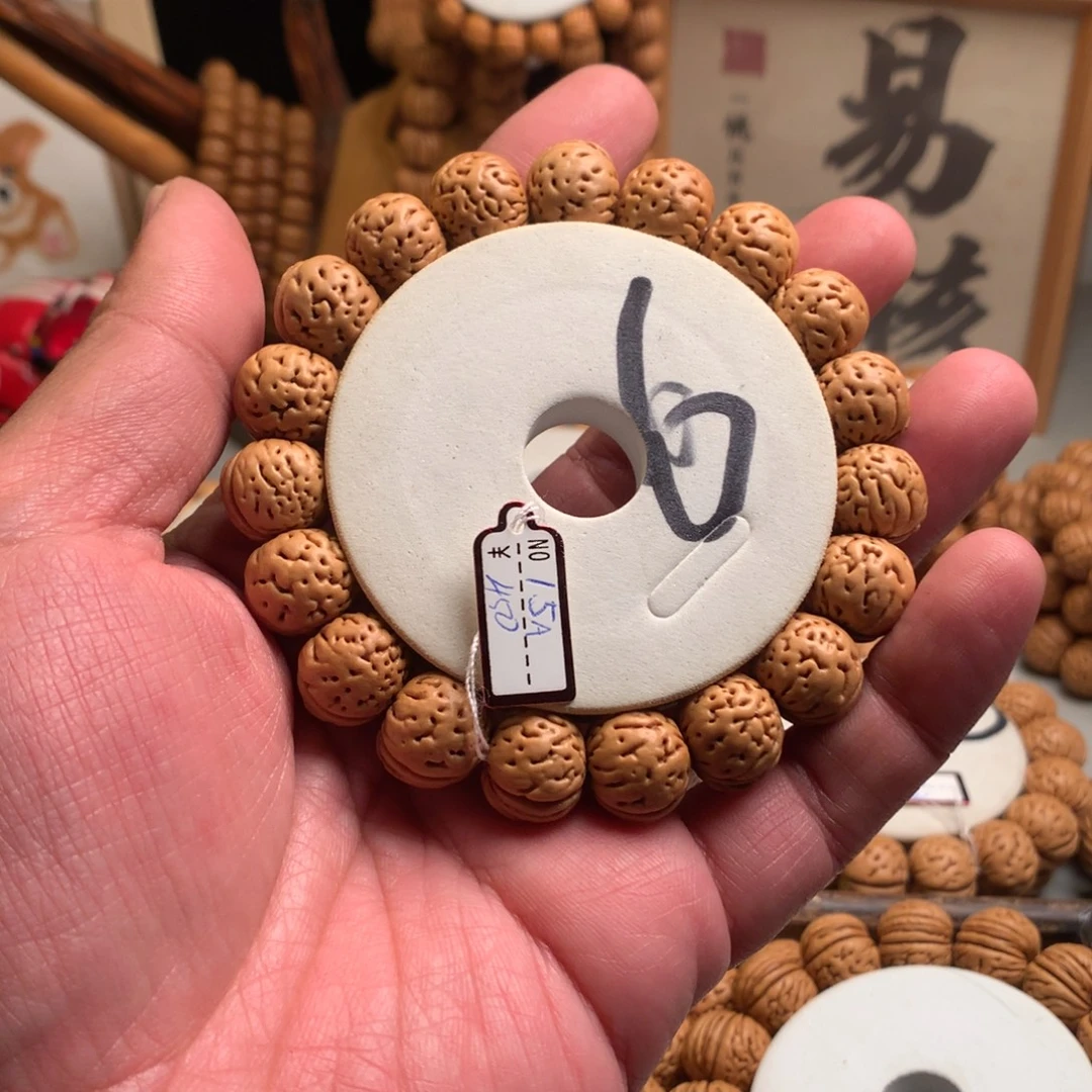 窦***生桃核手串1.5小馒头桃核手串