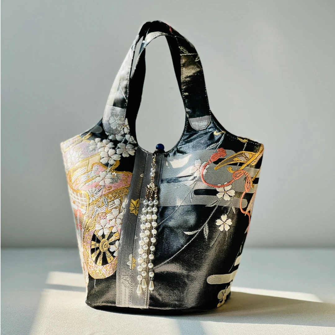 西阵织新款简约轻奢单肩斜挎手提包菜篮子包包小众高级黑色女包