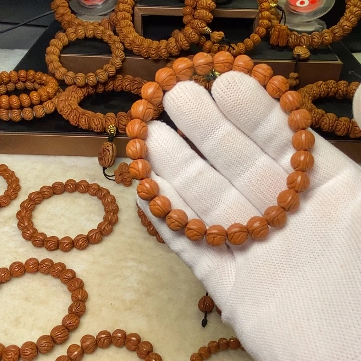 翊***)手串桃核秦岭龙纹桃核